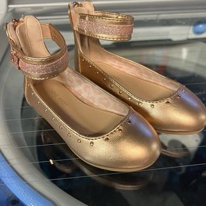 Nine west rose gold girls shoes.